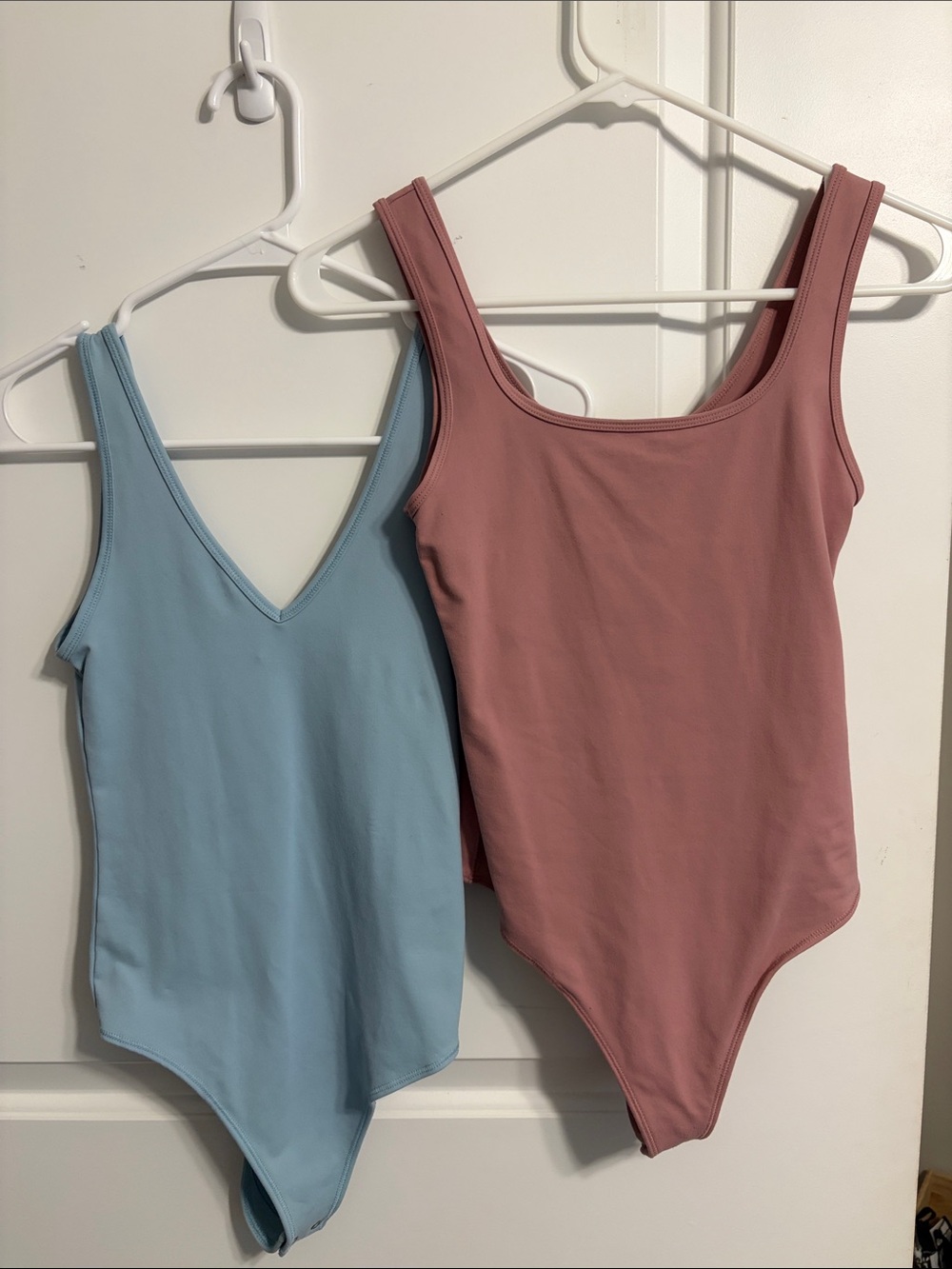 Abercrombie & Fitch Scoop One-Piece Bodysuits in Dusty Rose and Light Blue